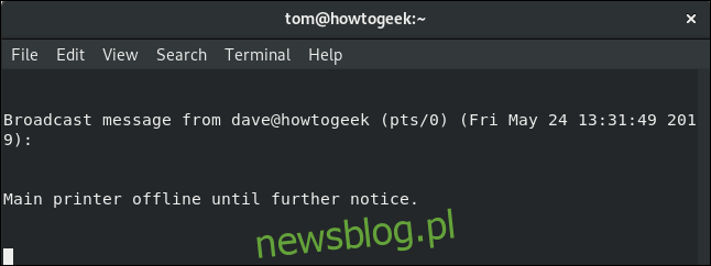 wiadomość na ścianie do lokalnego użytkownika tom w oknie terminala