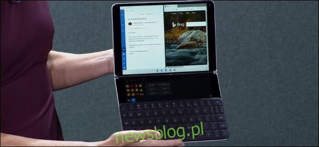 Urządzenie Surface Neo firmy Microsoft z podłączoną klawiaturą i widocznym paskiem Wunderbar.