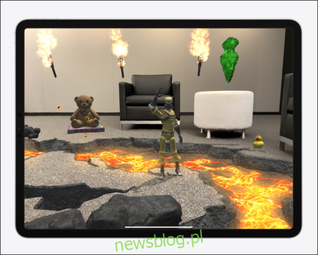 Wirtualne zabawki, postacie i krajobrazy w salonie Doświadczenie rzeczywistości rozszerzonej na iPadzie Pro.