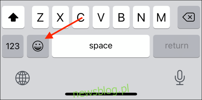 Stuknij przycisk Emoji na klawiaturze